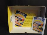 a box with a card game inside of it on a table