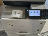 a printer that is sitting on top of a table