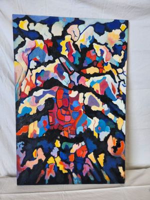 a painting of a colorful abstract painting on a white surface