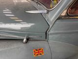 a close up of a car with a british flag sticker on it