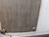 a metal plaque on the side of a bus