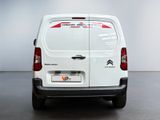 the back of a white van with a sticker on the side of it