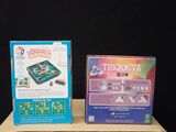 two boxes of toys that are sitting on a table