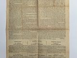 an old newspaper with a black and white image on it