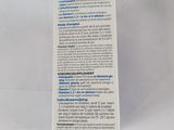 the back of a white box with a blue label on it