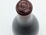 a bottle of wine that is sitting on a table