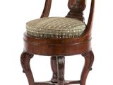 an image of a wooden chair with a cushion on it