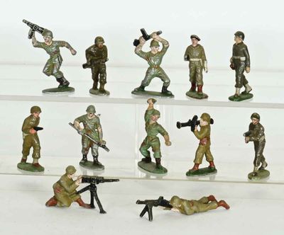 many figurines of soldiers with guns on display
