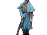 statue d'un homme vêtu d'un manteau bleu et tenant un fusil
