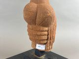 an image of a sculpture of a person ' s head on a black base
