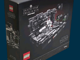 a box with a lego death star destroyer in it