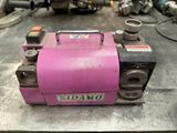 a pink machine that is sitting on a table