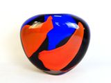 an image of a blue and orange vase on a white background