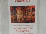 posters on the wall of a hotel in a foreign country
