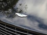 a close up of a car ' s emblem on the front of it