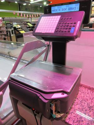 a machine that has a keyboard on it in a store