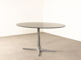 an image of a table with a glass top in a room