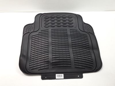 a close up of a black rubber floor mat on a white surface