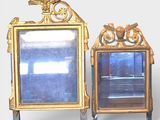 paire de miroirs dorés, ornés d'un oiseau en haut et d'un autre en bas