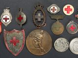 some of the medals and medals are on display on the table
