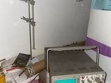 an image of a room with a computer and other electronics