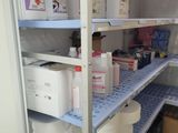 many containers and containers on the shelves in the room