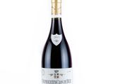 a close up of a bottle of wine on a white background