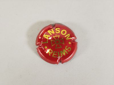 une image représentant un bouton rouge sur lequel figure le mot « Nixon »