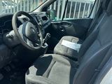 a picture of the inside of a car with the driver ' s seat down