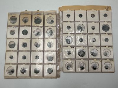 a lot of coins that are sitting in a box