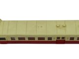 a toy train that is sitting on a white surface