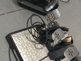 a lot of electronics sitting on the floor next to each other