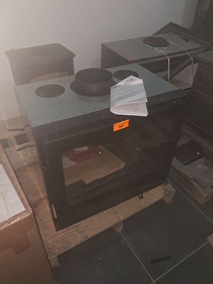 a stove with a glass top in a kitchen