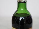 a bottle of wine that is sitting on a table