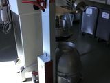 an image of a commercial kitchen with a large mixer