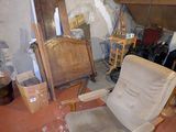 an image of a living room with a chair and a mirror