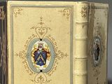 a book with a picture of a coat of arms on it