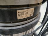 a close up of a metal object with a tag on it