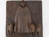 une image représentant une statue d'un homme avec un chien et des moutons