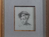 portrait of a young boy in a straw hat by person
