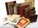 a lot of books that are sitting on a table