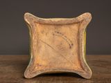 a small wooden box with a picture of a horse on it