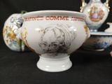 a white bowl with a picture of a man on it