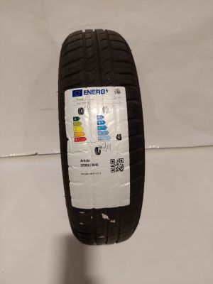 a close up of a tire with a sticker on it