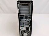 a close up of a computer tower on a white surface