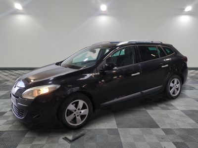 a picture of a black car parked in a garage
