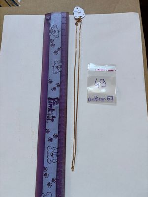 a picture of a ruler and a piece of paper on a table