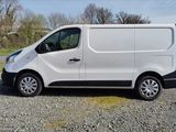 a white van that is parked in a lot