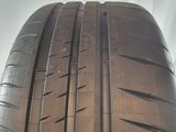 the tire of a car is shown on the side of the road