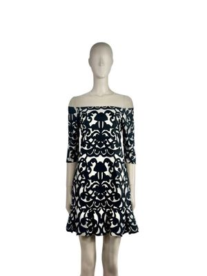 a mannequin dress with a black and white pattern on it